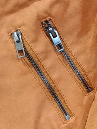 Giubbotto effetto pelle color pesca