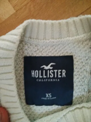 Sudadera de rayas azul, gris y blanco