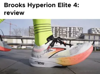 Zapatillas maratón Brooks grises y naranjas