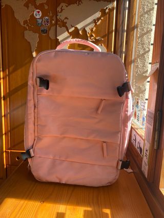 Mochila cabina avión rosa