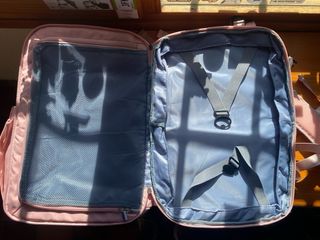 Mochila cabina avión rosa