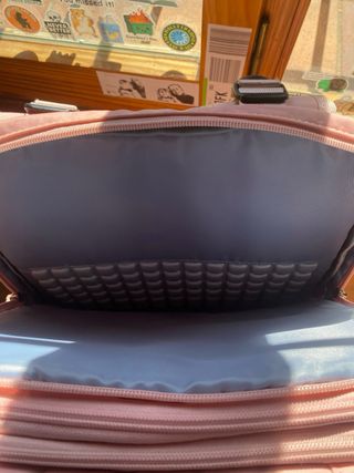 Mochila cabina avión rosa