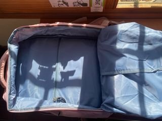 Mochila cabina avión rosa