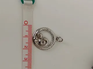 Ciondolo unisex onde mare argentato