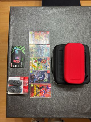 Nintendo Switch + 5 Giochi + 4 Controller + Accessori