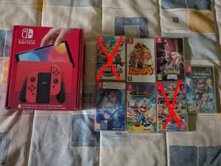 Pacchetto Nintendo Switch OLED Edizione Mario + Giochi