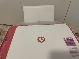 Fotocopiadora HP rosa y blanca