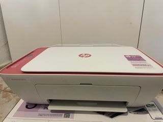 Fotocopiadora HP rosa y blanca