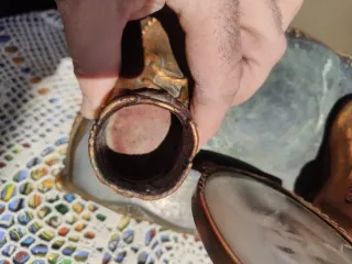 Foto antigua con botitas bronce