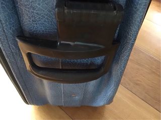 Maleta azul de viaje