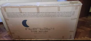 Cuna de madera blanca