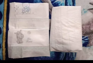 Cuna de madera blanca