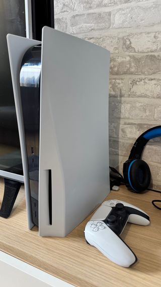 PlayStation 5 + Mando Bianco