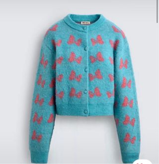 Cárdigan azul con lazos rosas Talla S