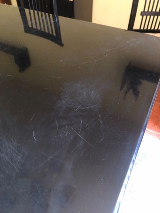 Mesa comedor negra con 6 sillas tapizadas