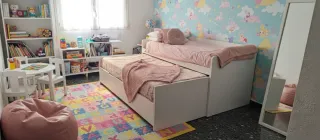 Cama nido blanca y rosa