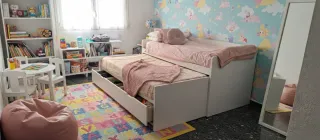 Cama nido blanca y rosa