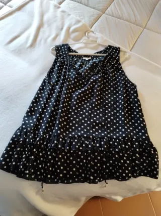 Blusa de lunares negra y blanca