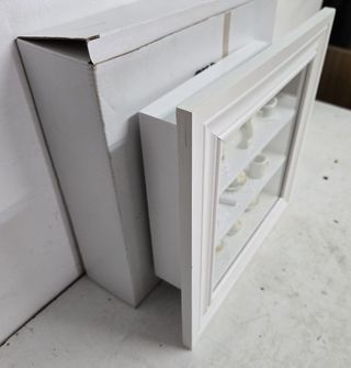 Quadro con interno in miniatura di camera da letto