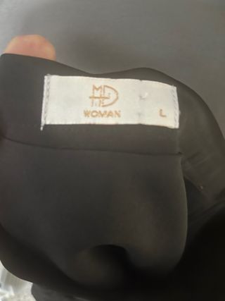 Falda negra con volantes talla L