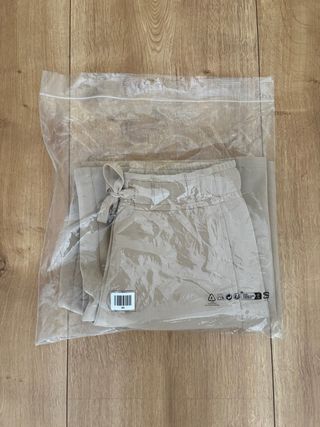 Pantalón palazzo Calzedonia beige Talla S