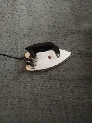 Plancha antigua de metal