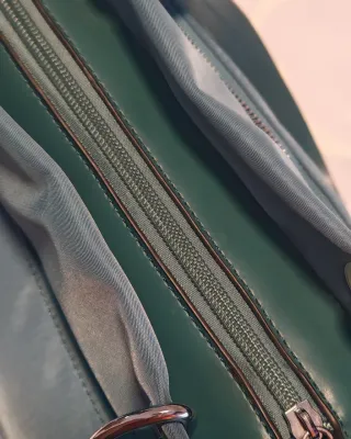 Bolso azul y verde azulado