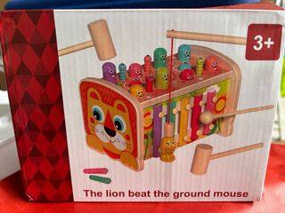 Juguete de madera león y xilófono