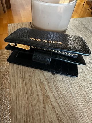 Cartera Michael Kors Negra en piel.
