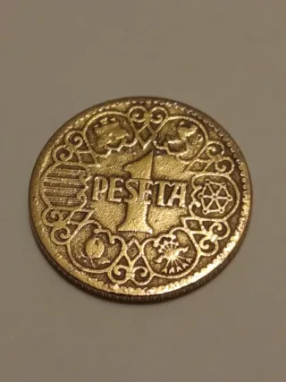 3 monedas de 1 Peseta española, acuñada en 1944.