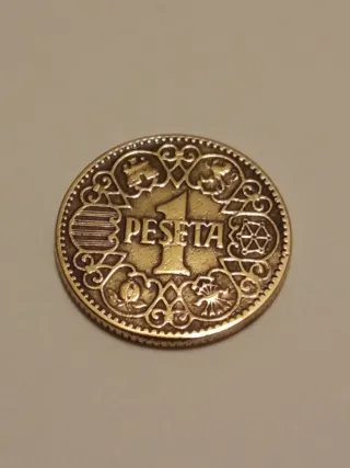 3 monedas de 1 Peseta española, acuñada en 1944.