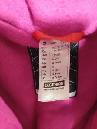 Mono de nieve rosa y morado para niño. Talla 8.