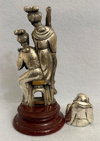 Antiche statuine argentate