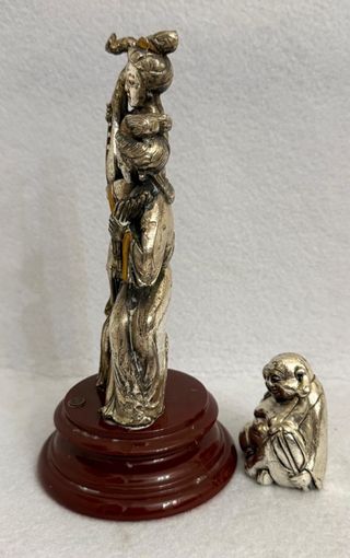Antiche statuine argentate