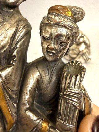 Antiche statuine argentate