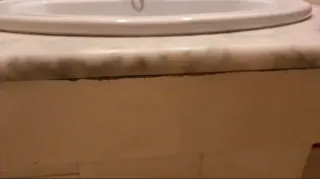 Mueble de baño con lavabo de mármol