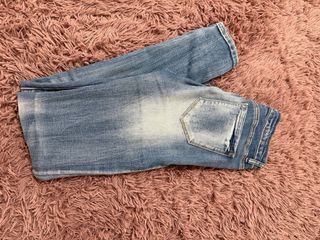 Jeans skinny vita alta strappati
