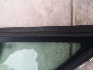 Luna lateral trasera izquierda Audi