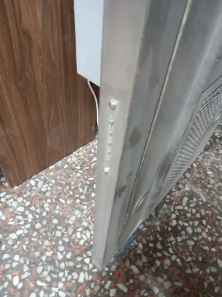 Campana extrac de isla,tiene polvo está nueva