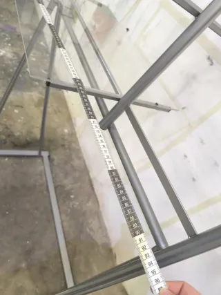 Expositor Slazenger metálico con estantes