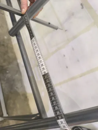 Expositor Slazenger metálico con estantes