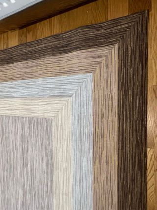 Alfombra vinílica a medida beige y marrón