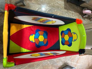 Cuna de viaje con diseño infantil