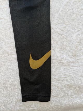 Mallas Nike Negro y Dorado Talla M