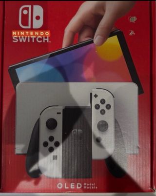 Nintendo Switch OLED Blanca mas tres juegos !