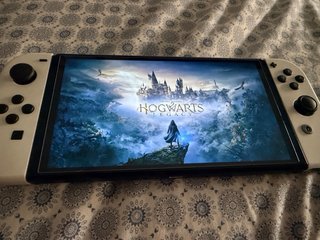 Nintendo Switch OLED Blanca mas 4 juego   Hogwars