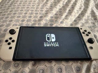 Nintendo Switch OLED Blanca mas 4 juego   Hogwars