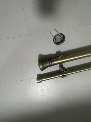 Conjunto doble barra cortina bronce.