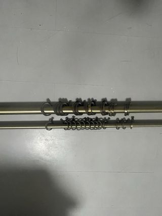 Conjunto doble barra cortina bronce.