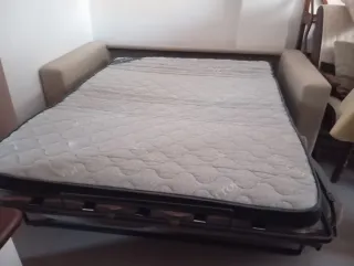 Sofá cama beige de tela